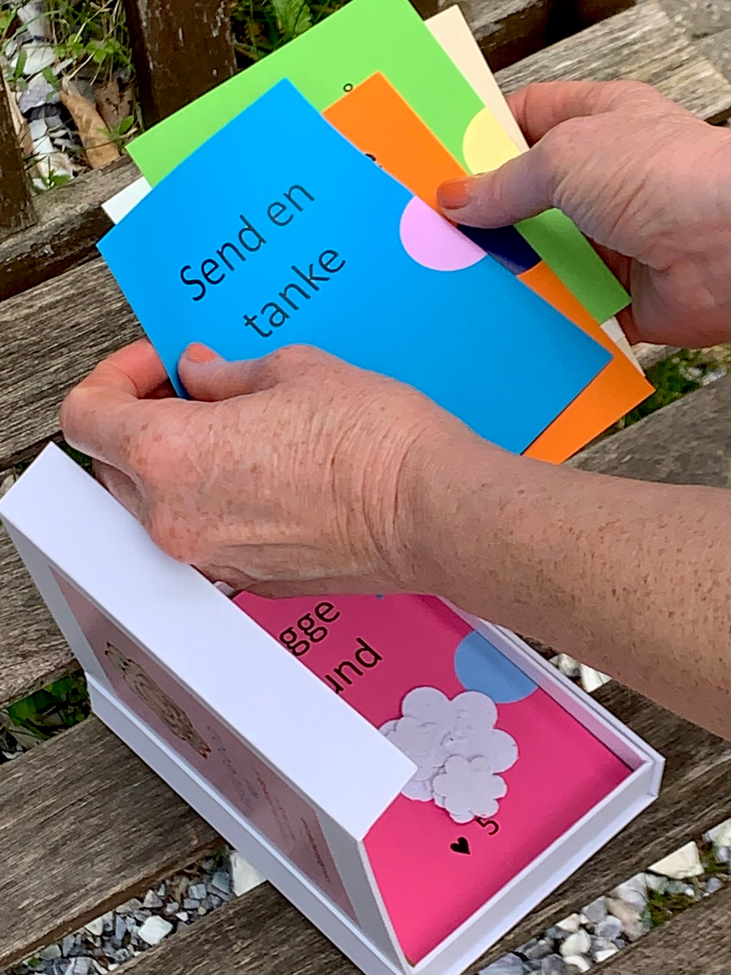 Feel Good Cards arranged with eucalyptus and tea